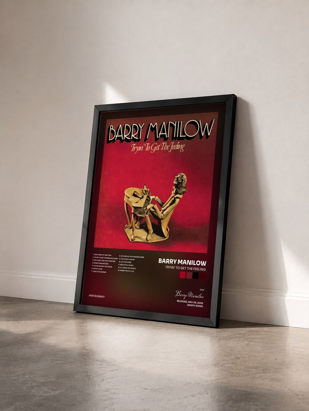 #noir Tableau de l'album Tryin' To Get The Feeling de Barry Manilow vu de trois quarts, cadre noir