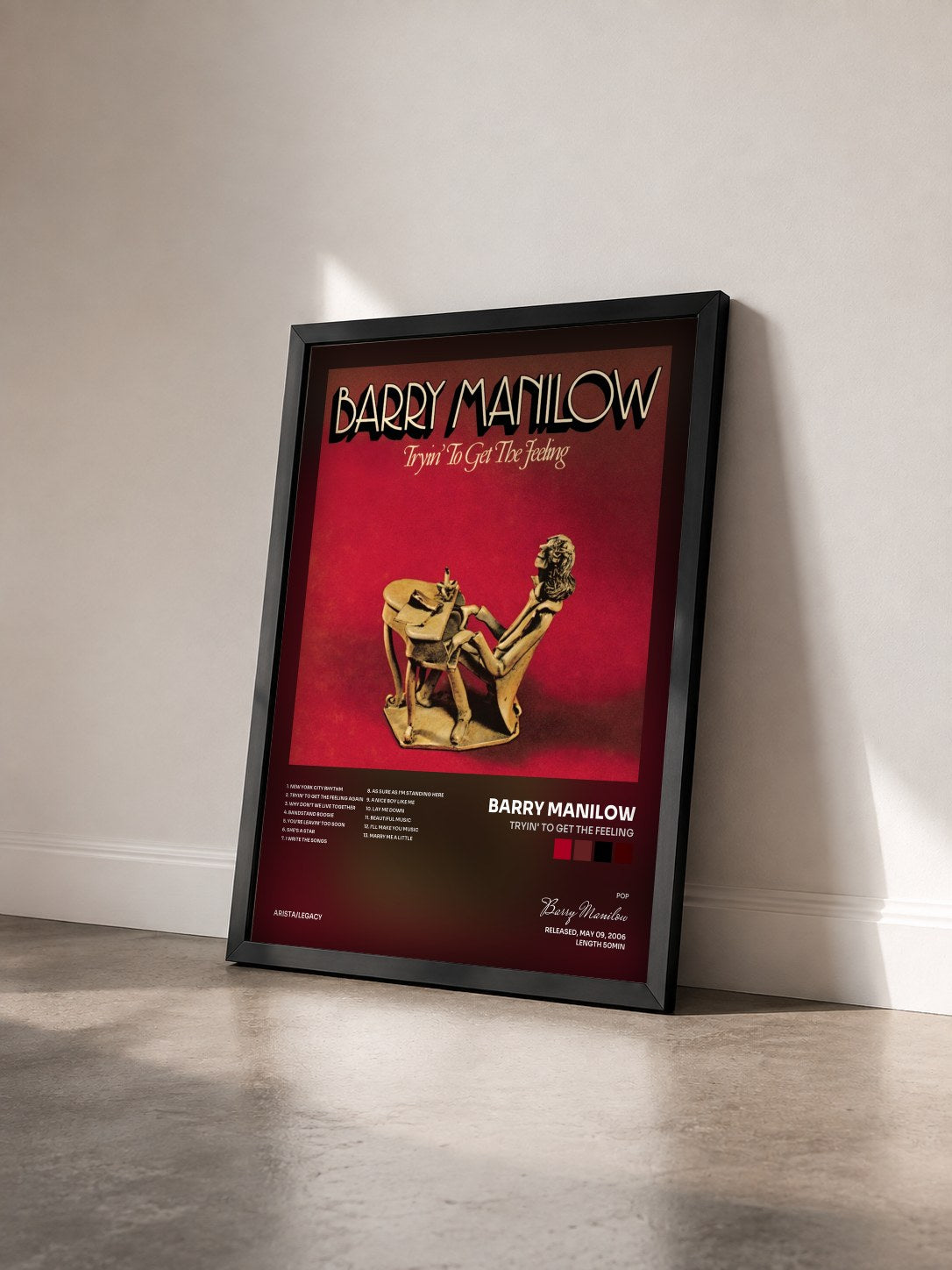 #noir Tableau de l'album Tryin' To Get The Feeling de Barry Manilow vu de trois quarts, cadre noir