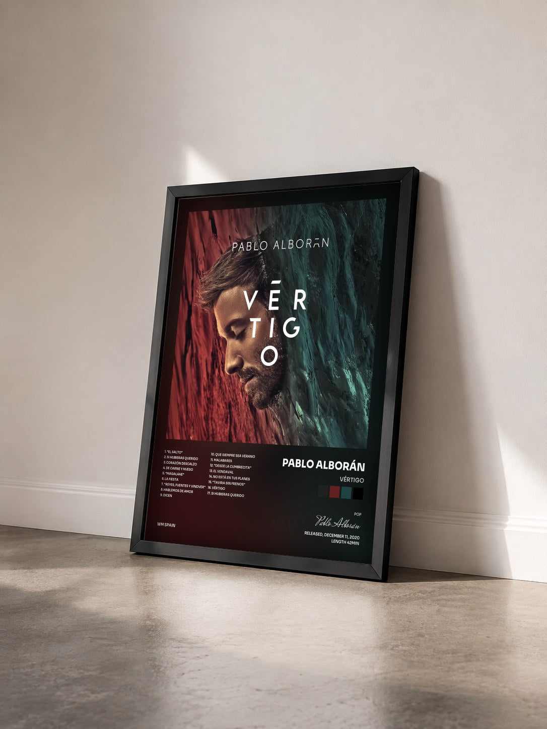 #noir Tableau de l'album Vértigo de Pablo Alborán vu de trois quarts, cadre noir