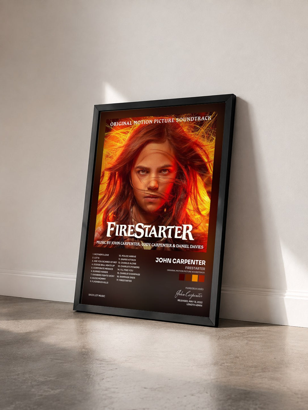 #noir Tableau de l'album Firestarter (Original Motion Picture Soundtrack) de John Carpenter vu de trois quarts, cadre noir