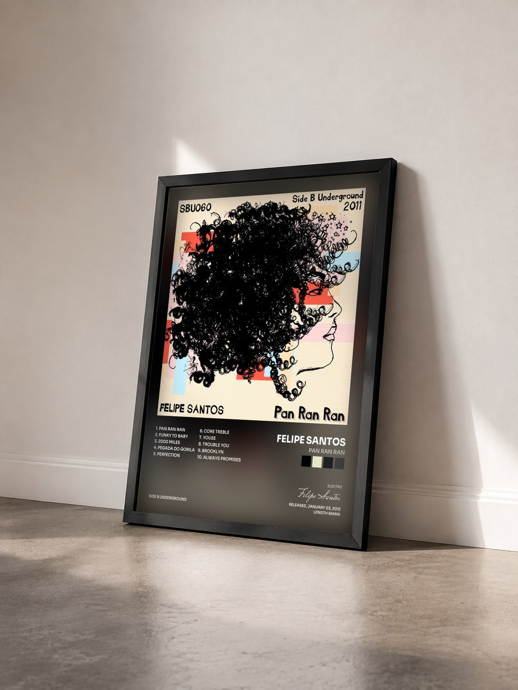 #noir Tableau de l'album Pan Ran Ran de Felipe Santos vu de trois quarts, cadre noir