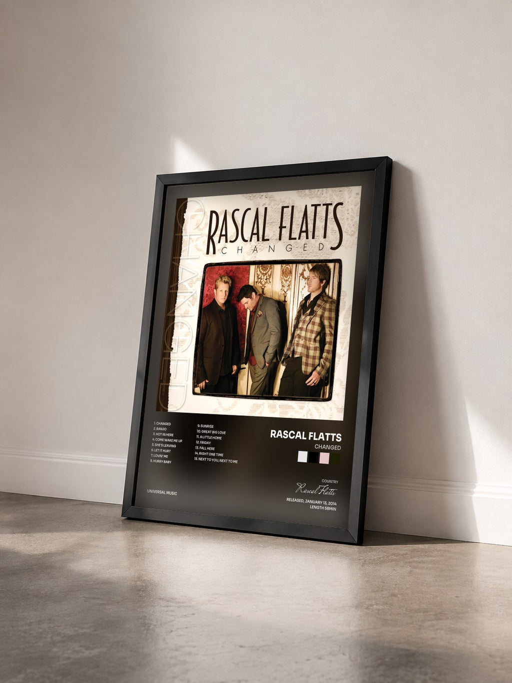 #noir Tableau de l'album Changed de Rascal Flatts vu de trois quarts, cadre noir