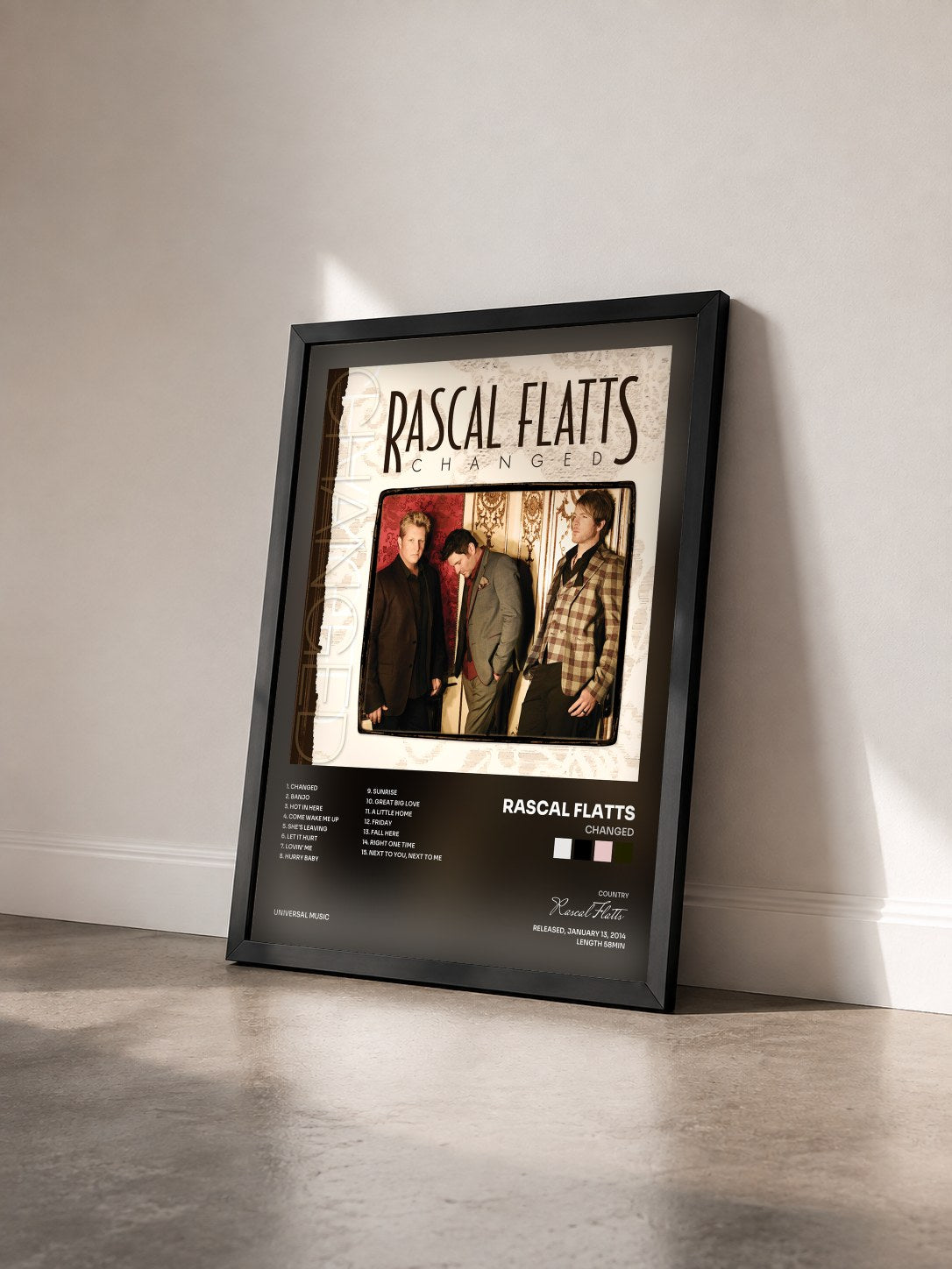 #noir Tableau de l'album Changed de Rascal Flatts vu de trois quarts, cadre noir