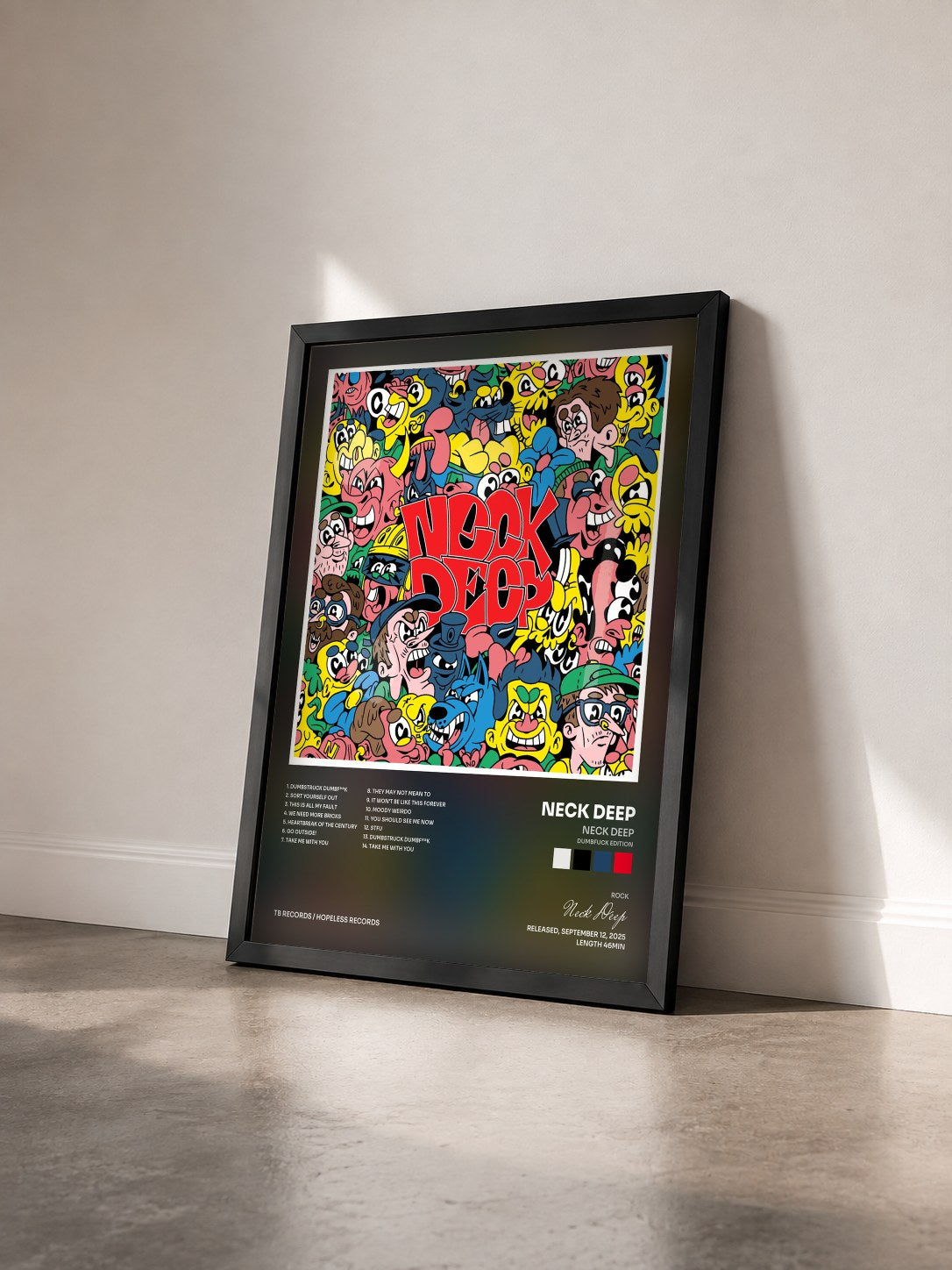 #noir Tableau de l'album Neck Deep (Dumbfuck Edition) de Neck Deep vu de trois quarts, cadre noir