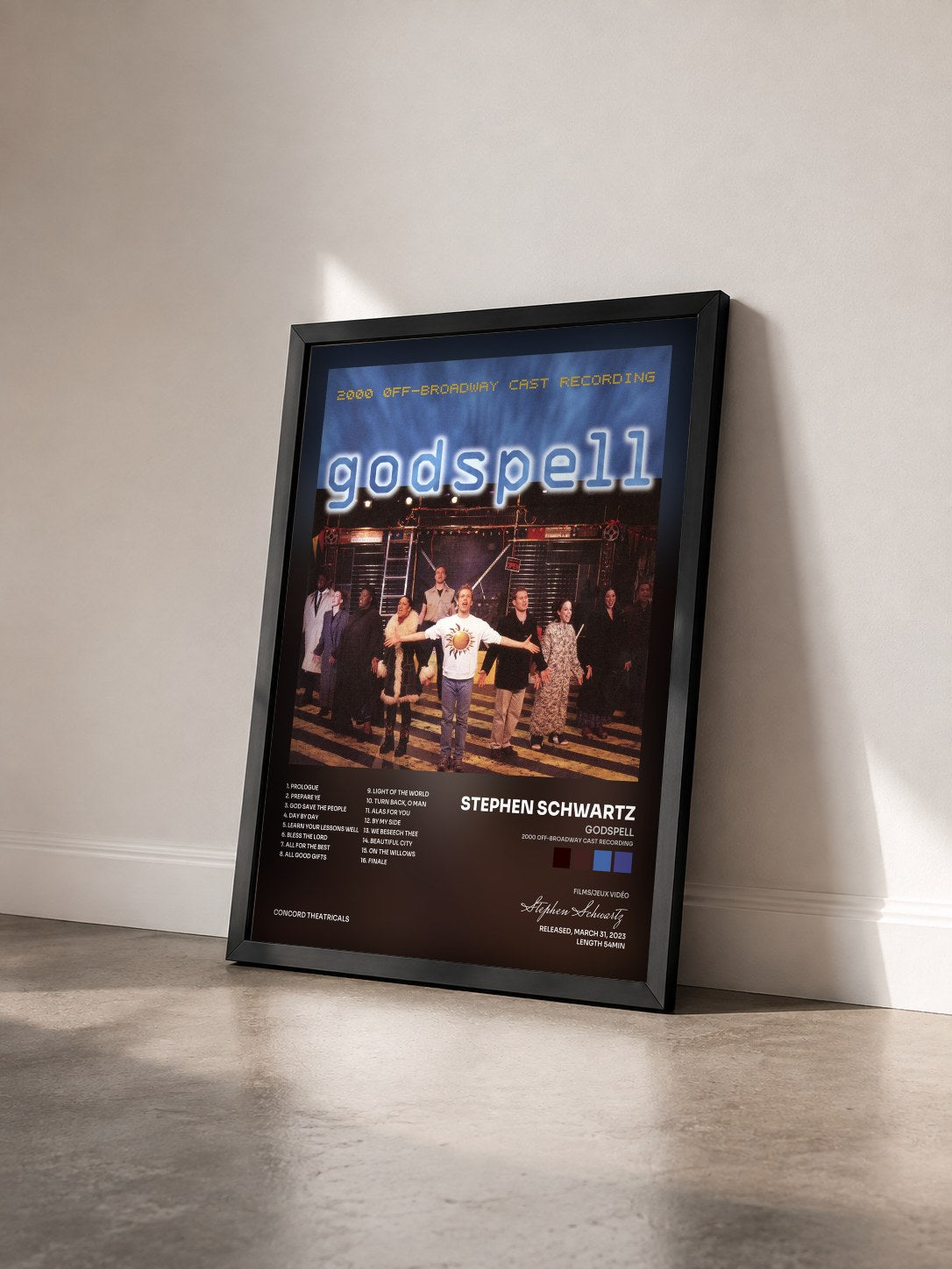#noir Tableau de l'album Godspell (2000 Off-Broadway Cast Recording) de Stephen Schwartz vu de trois quarts, cadre noir
