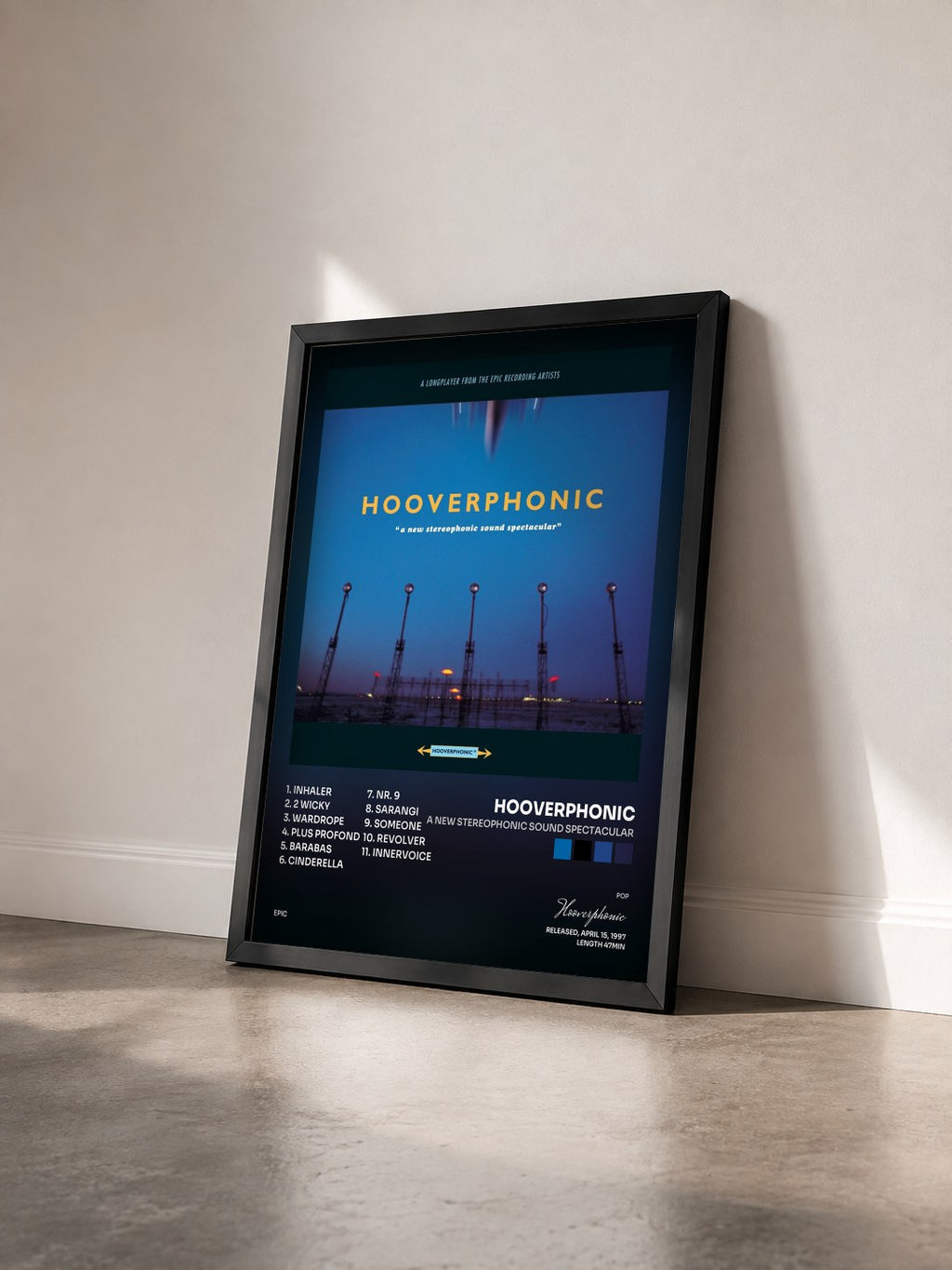 #noir Tableau de l'album A New Stereophonic Sound Spectacular de Hooverphonic vu de trois quarts, cadre noir