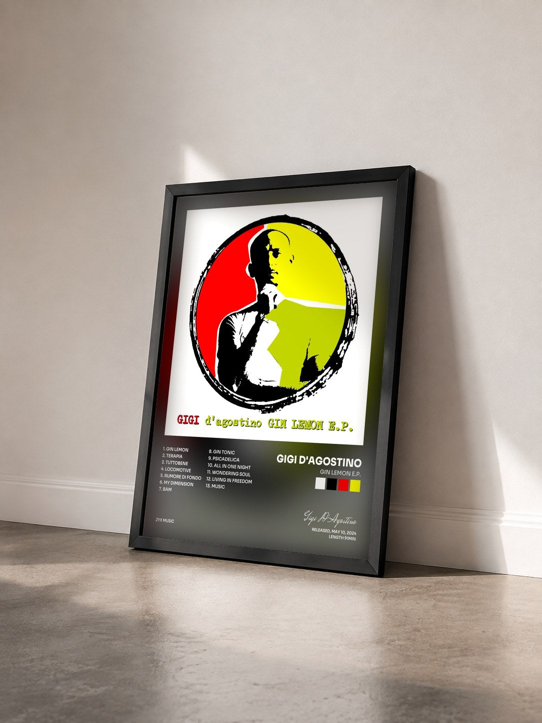 #noir Tableau de l'album Gin Lemon E.P. de Gigi D'Agostino vu de trois quarts, cadre noir