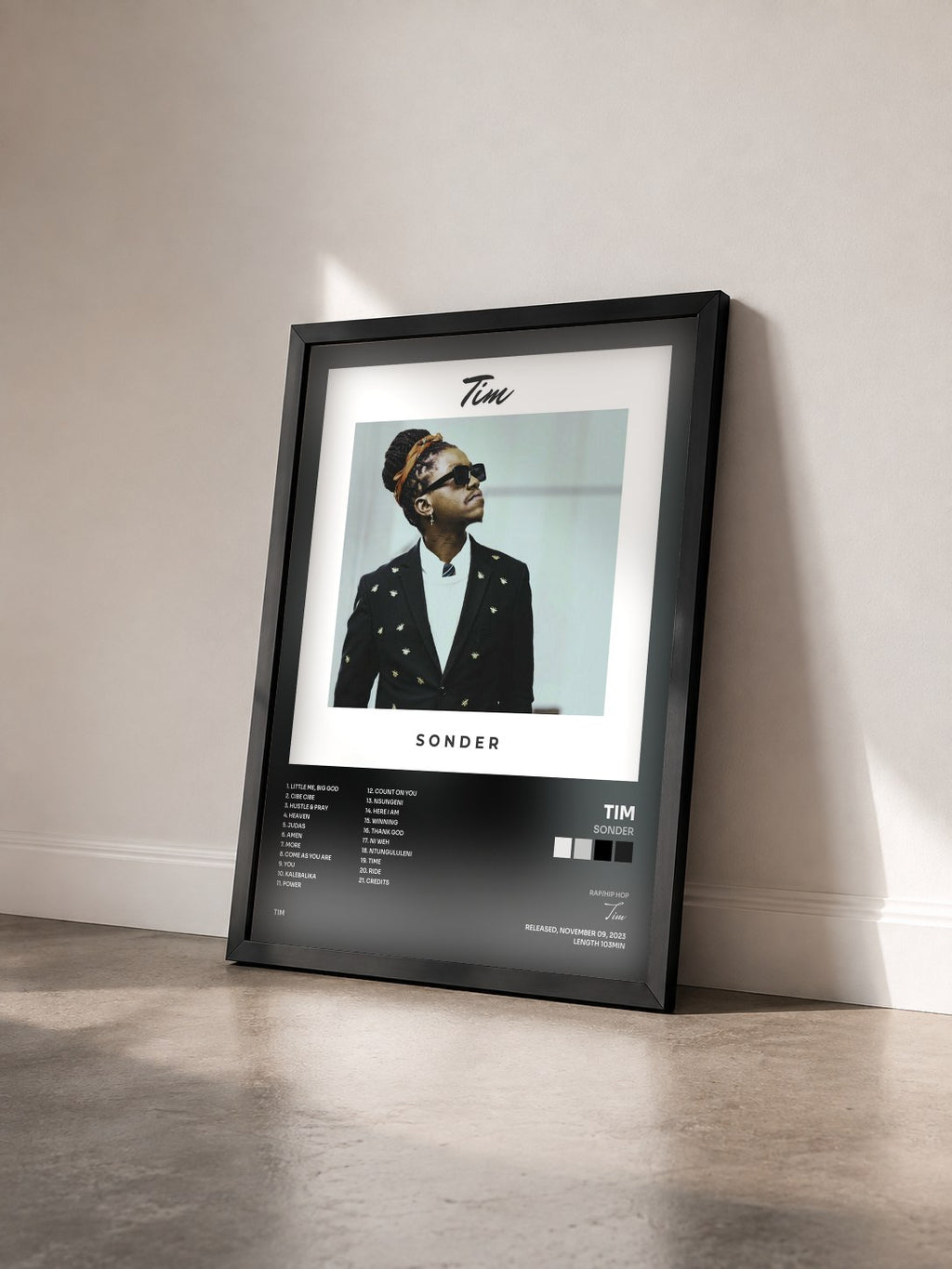 #noir Tableau de l'album SONDER de Tim vu de trois quarts, cadre noir