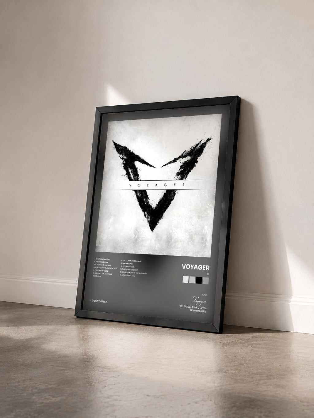 #noir Tableau de l'album V de Voyager vu de trois quarts, cadre noir