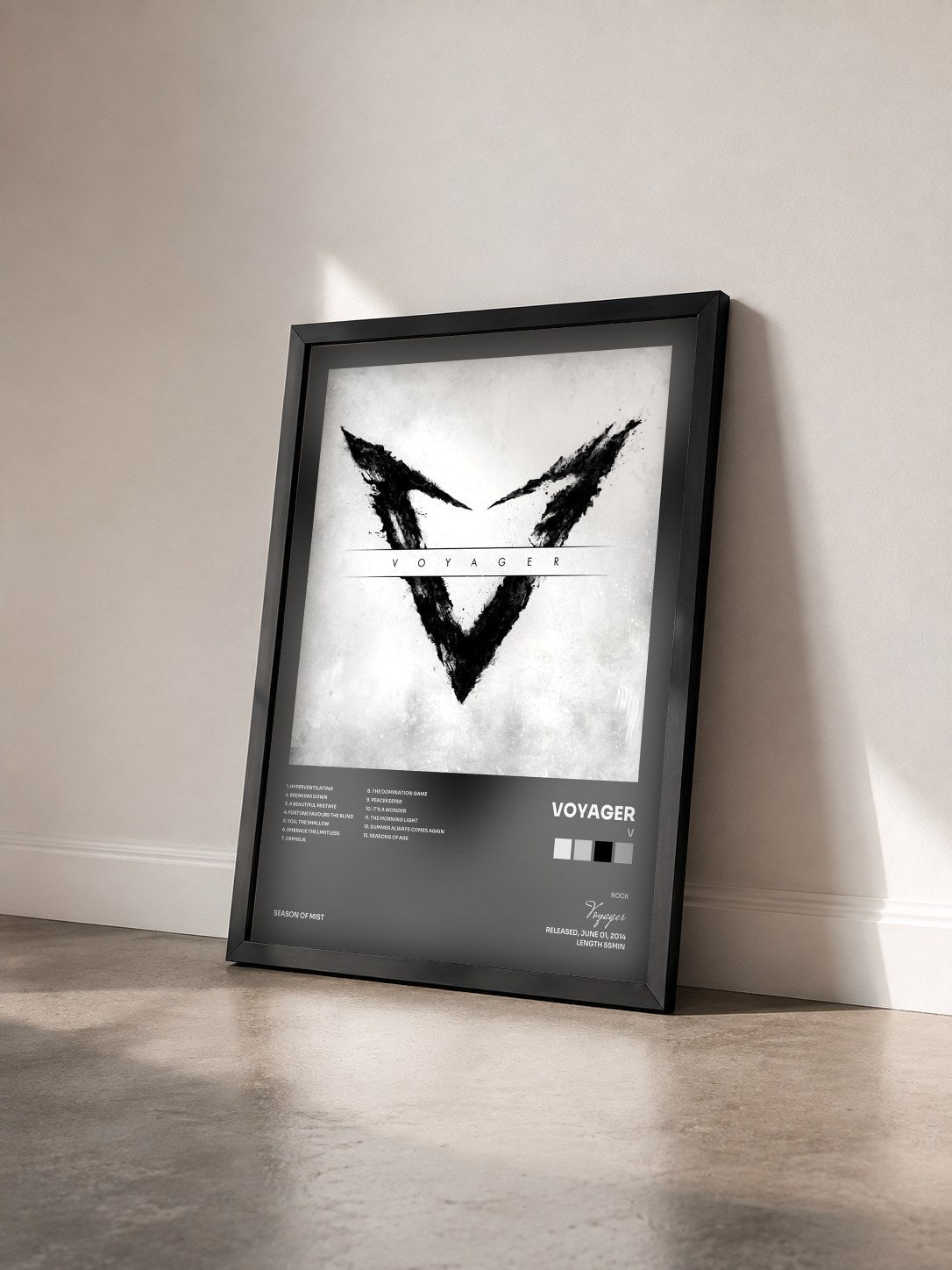 #noir Tableau de l'album V de Voyager vu de trois quarts, cadre noir
