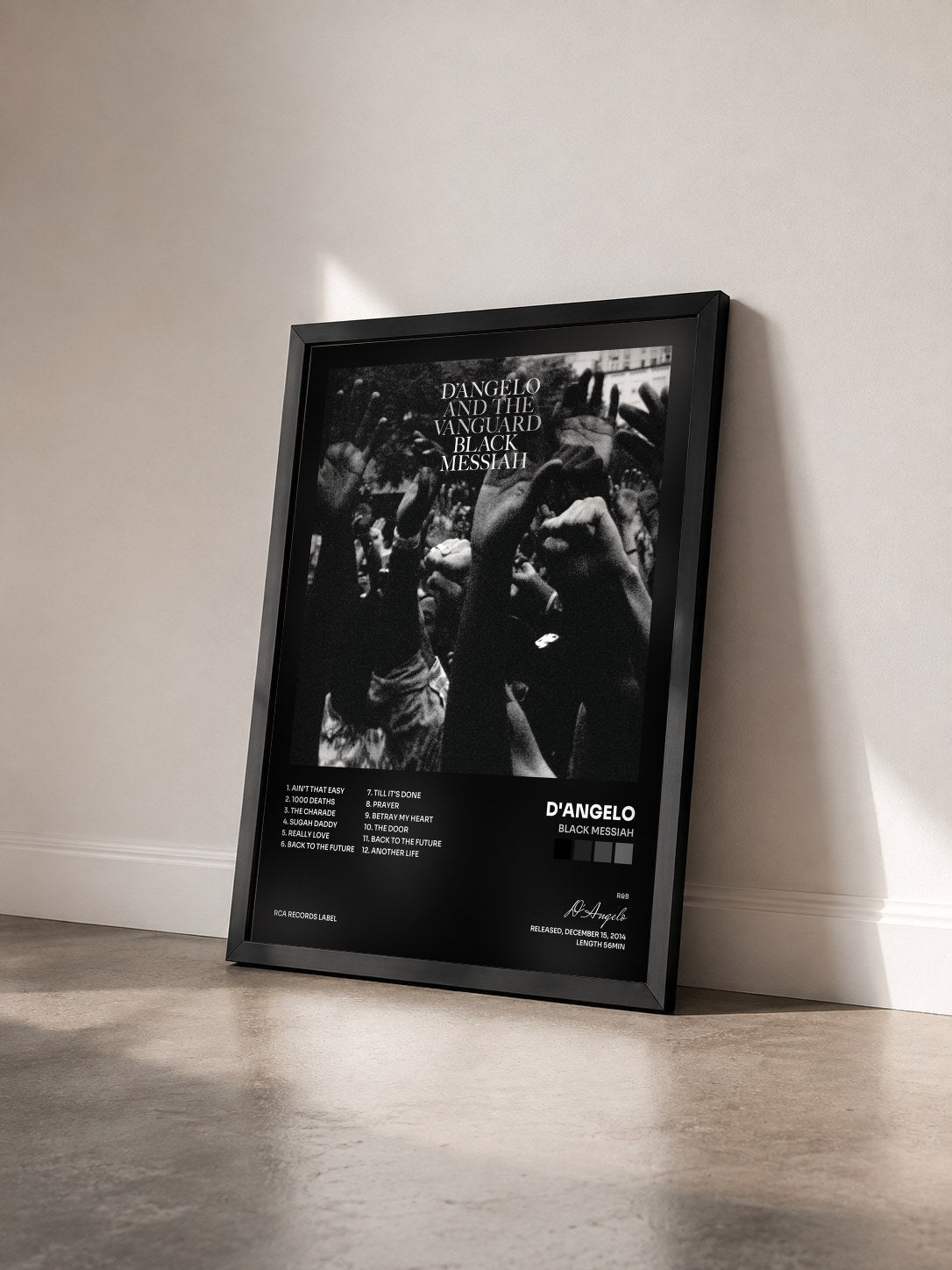 #noir Tableau de l'album Black Messiah de D'Angelo vu de trois quarts, cadre noir