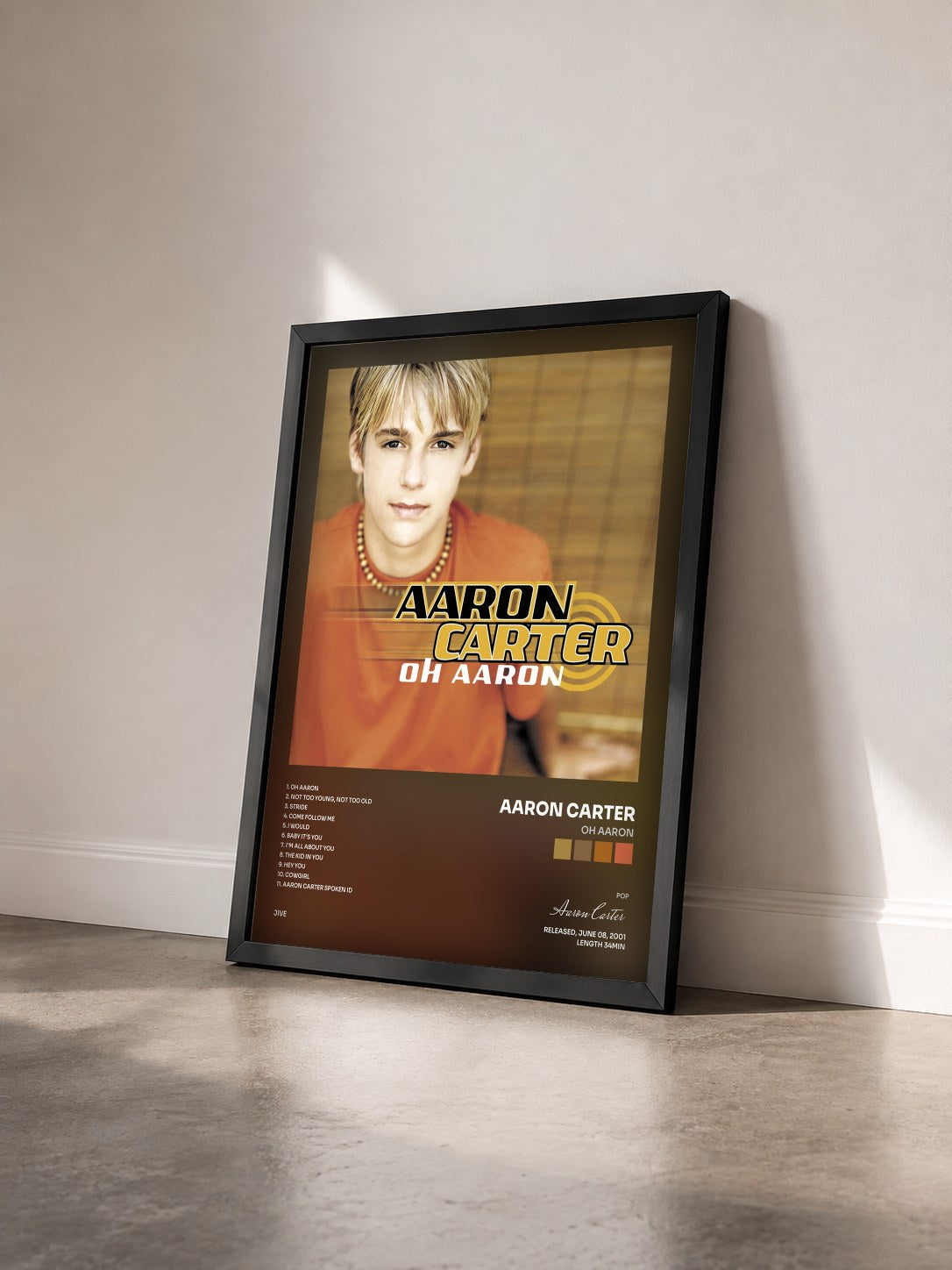 #noir Tableau de l'album Oh Aaron de Aaron Carter vu de trois quarts, cadre noir