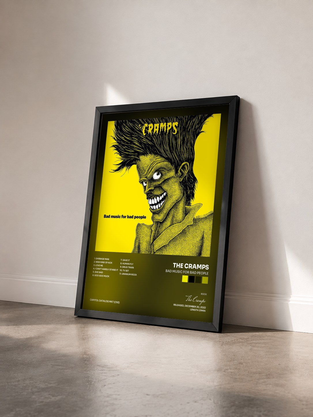 #noir Tableau de l'album Bad Music For Bad People de The Cramps vu de trois quarts, cadre noir