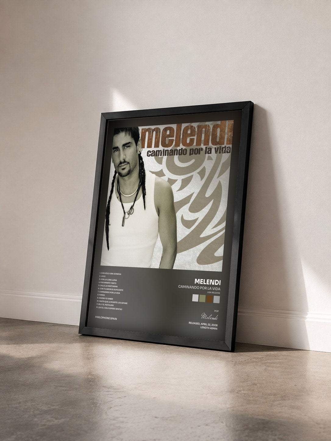 #noir Tableau de l'album Caminando Por La Vida (USA Release) de Melendi vu de trois quarts, cadre noir