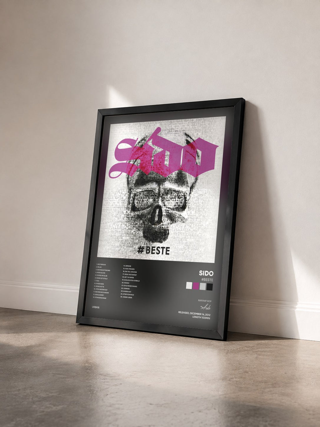 #noir Tableau de l'album #Beste de Sido vu de trois quarts, cadre noir