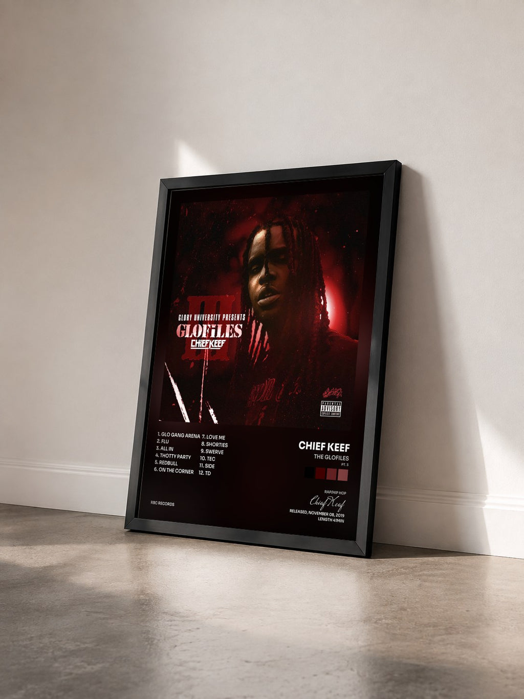 #noir Tableau de l'album The GloFiles (Pt. 3) de Chief Keef vu de trois quarts, cadre noir