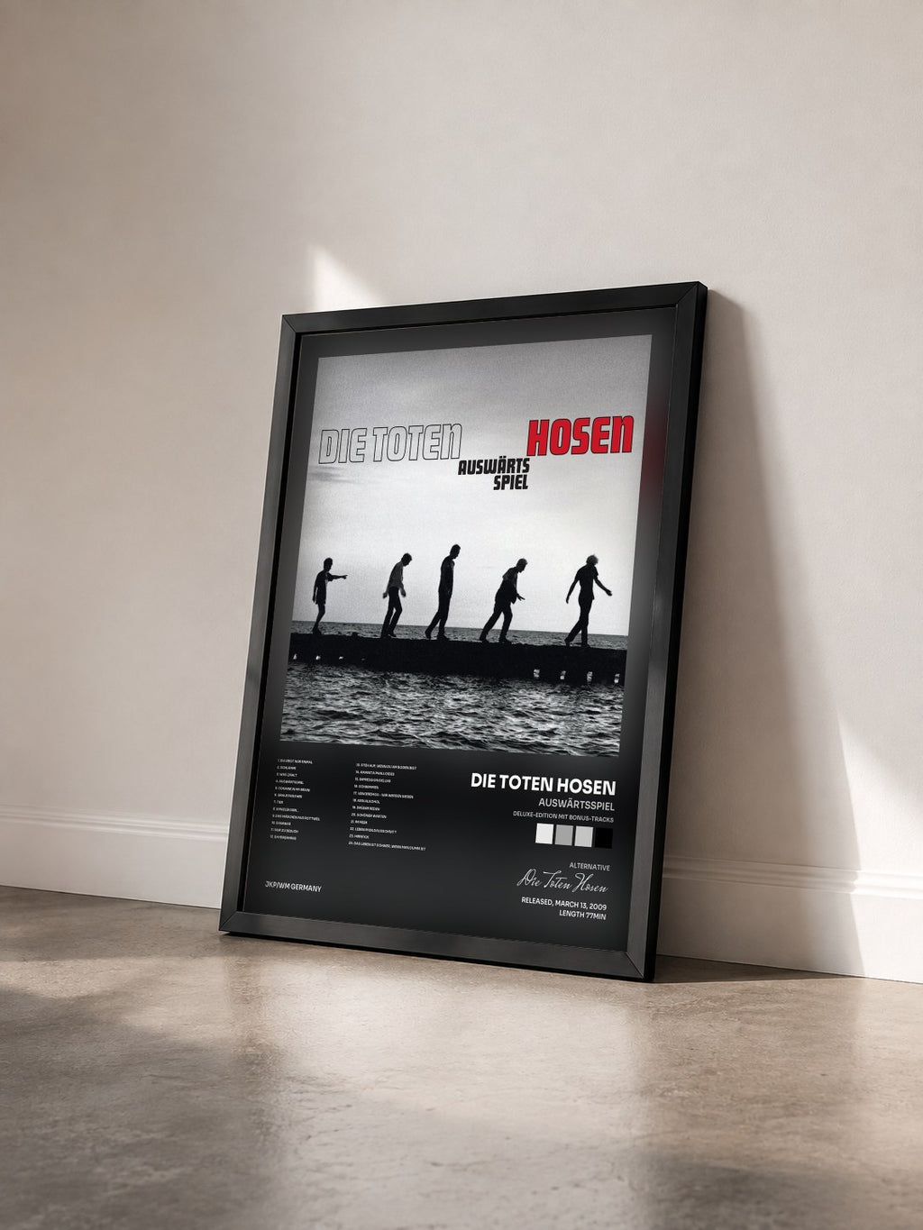 #noir Tableau de l'album Auswärtsspiel (Deluxe-Edition mit Bonus-Tracks) de Die Toten Hosen vu de trois quarts, cadre noir