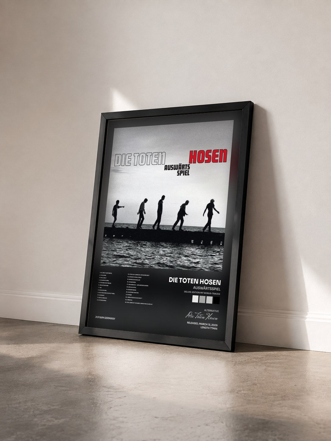 #noir Tableau de l'album Auswärtsspiel (Deluxe-Edition mit Bonus-Tracks) de Die Toten Hosen vu de trois quarts, cadre noir