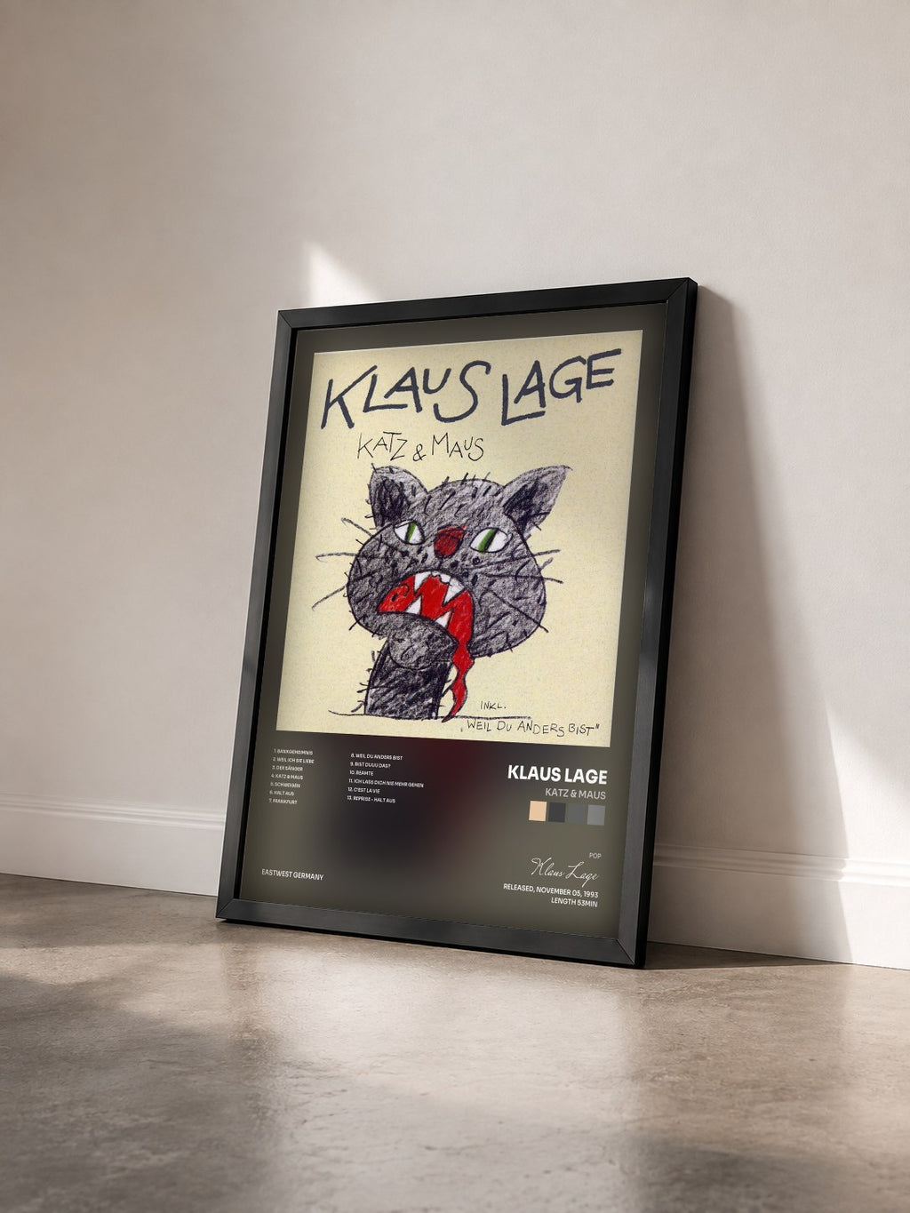 #noir Tableau de l'album Katz & Maus de Klaus Lage vu de trois quarts, cadre noir