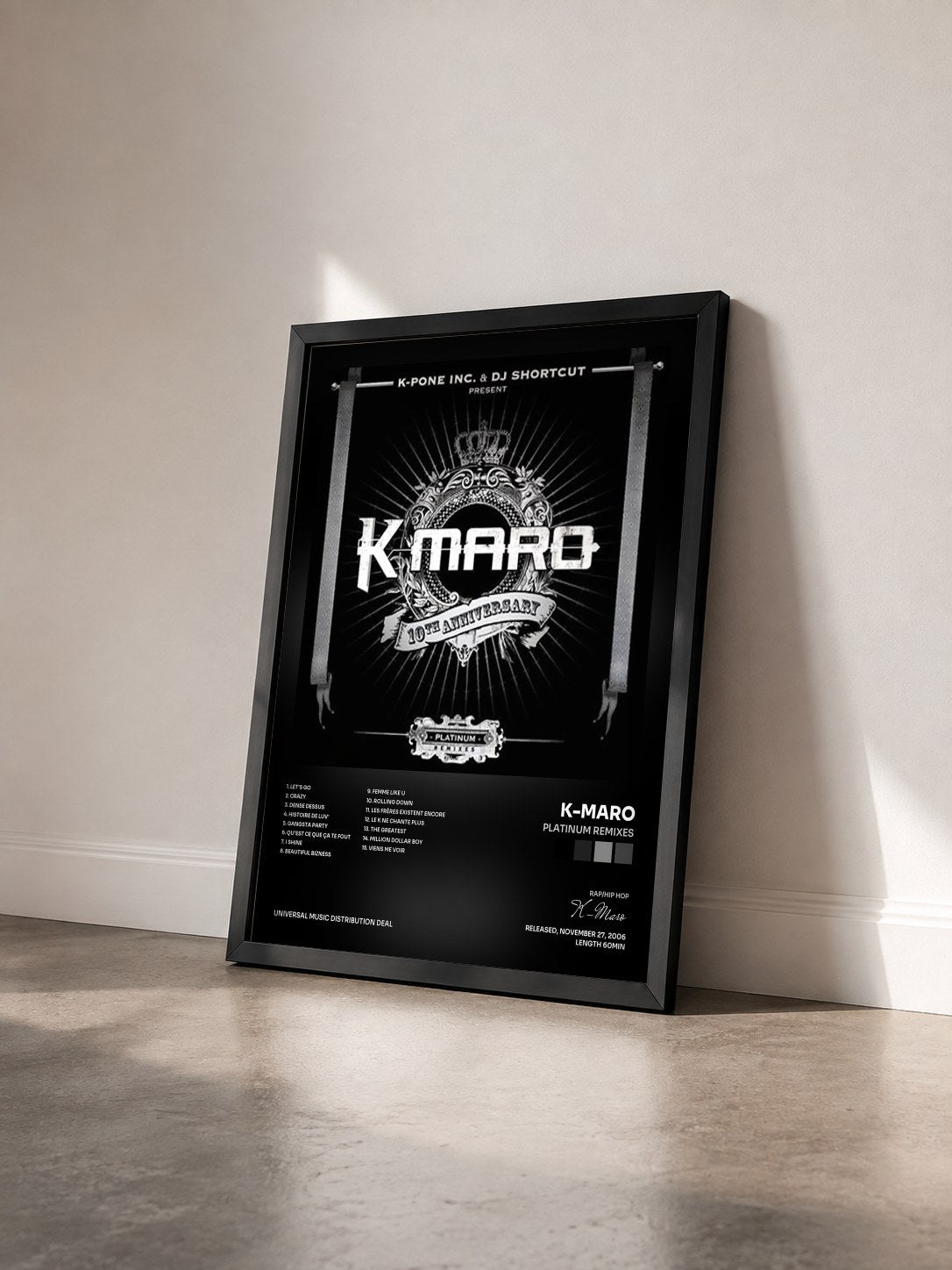 #noir Tableau de l'album Platinum Remixes de K-Maro vu de trois quarts, cadre noir