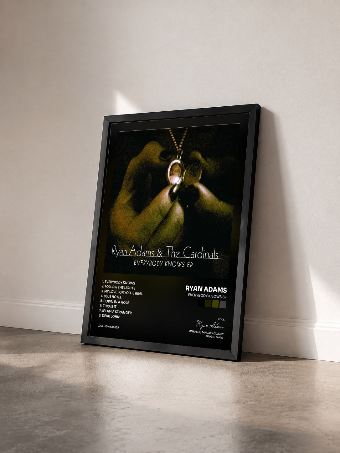 #noir Tableau de l'album Everybody Knows EP de Ryan Adams vu de trois quarts, cadre noir