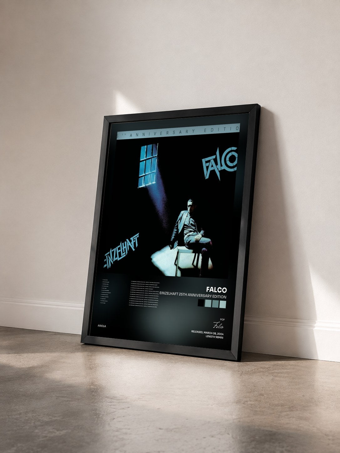 #noir Tableau de l'album Einzelhaft 25th Anniversary Edition de Falco vu de trois quarts, cadre noir