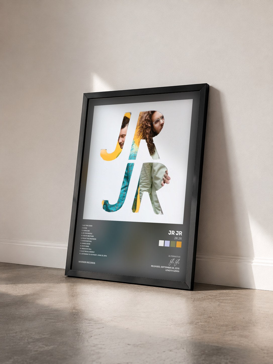 #noir Tableau de l'album JR JR de Jr Jr vu de trois quarts, cadre noir