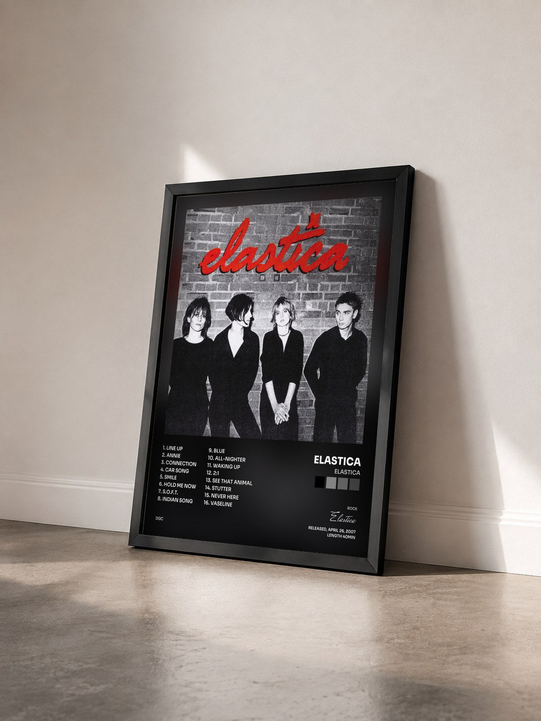 #noir Tableau de l'album Elastica de Elastica vu de trois quarts, cadre noir