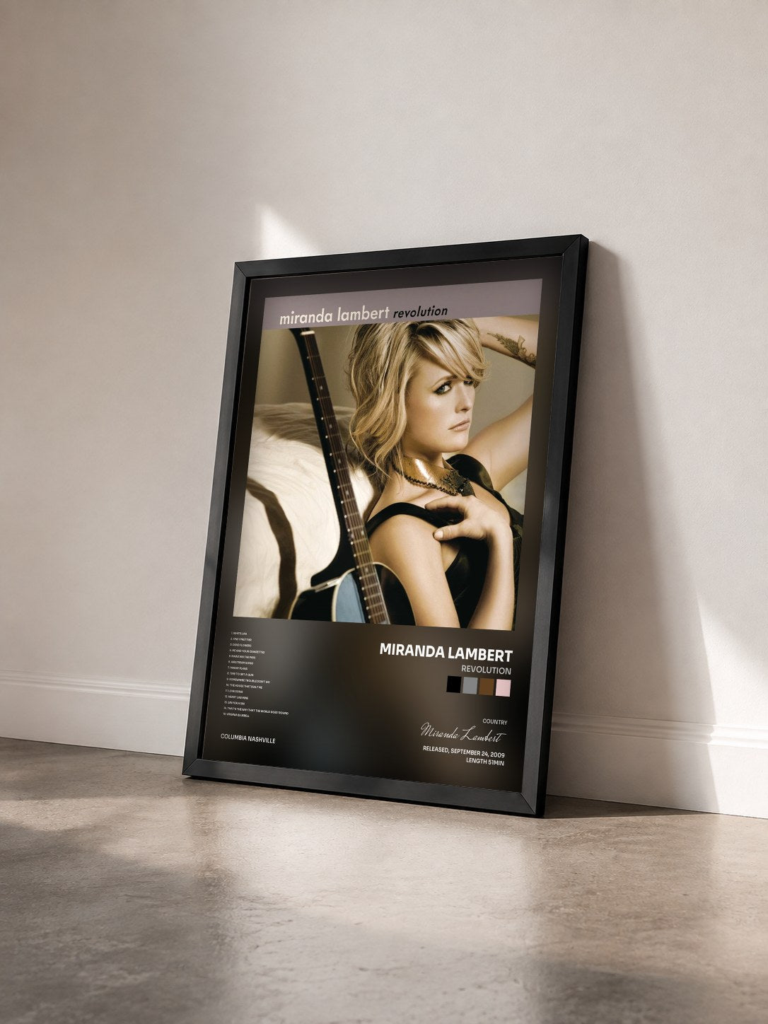 #noir Tableau de l'album Revolution de Miranda Lambert vu de trois quarts, cadre noir