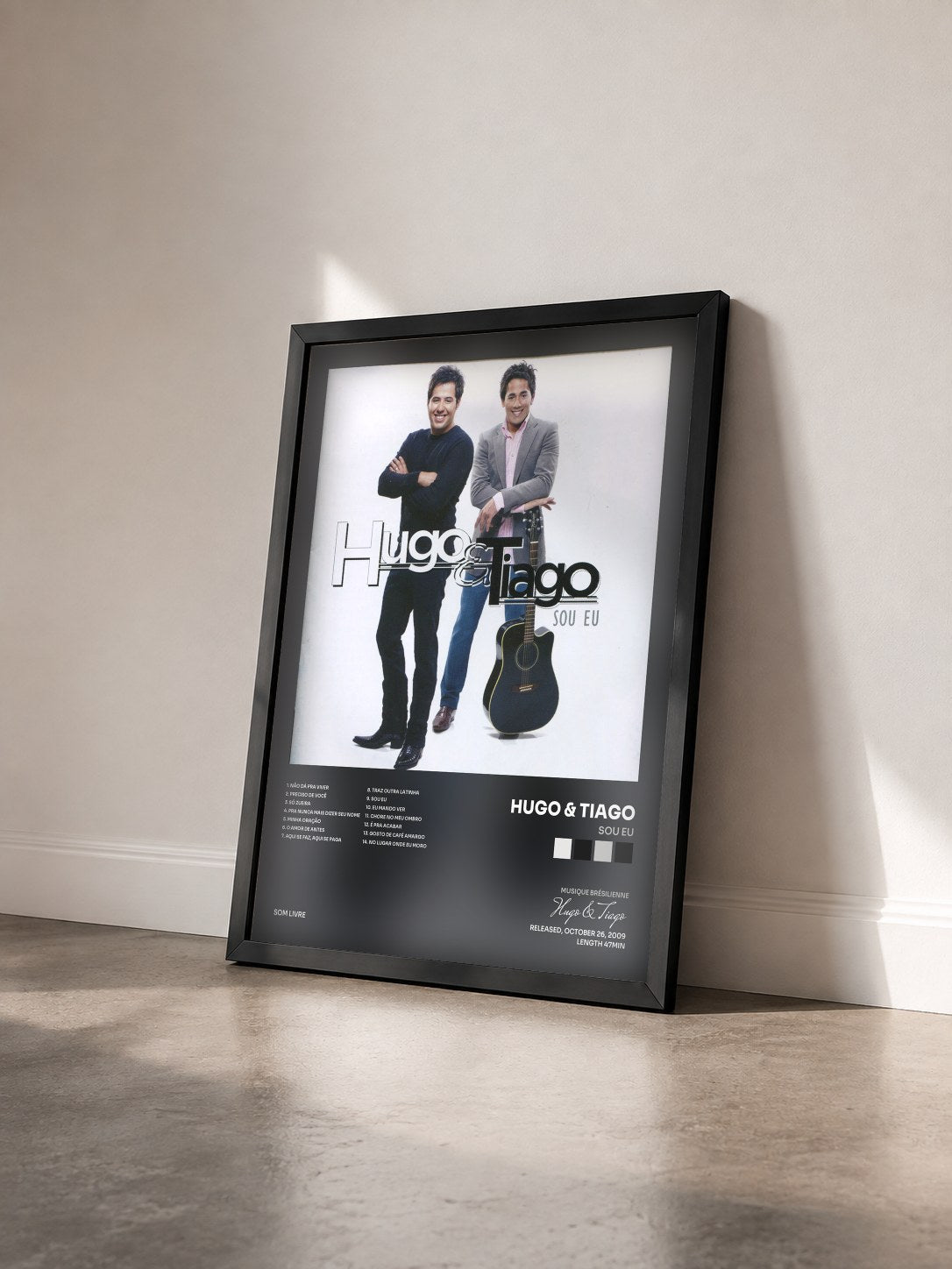 #noir Tableau de l'album Sou Eu de Hugo & Tiago vu de trois quarts, cadre noir