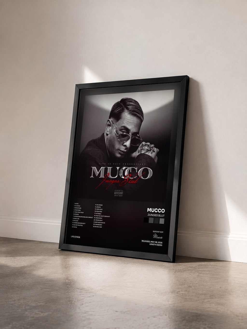 #noir Tableau de l'album Junges Blut de Mucco vu de trois quarts, cadre noir