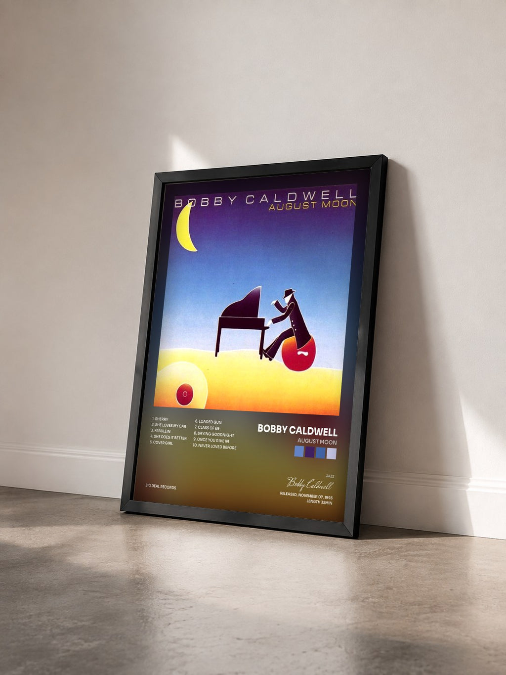 #noir Tableau de l'album August Moon de Bobby Caldwell vu de trois quarts, cadre noir