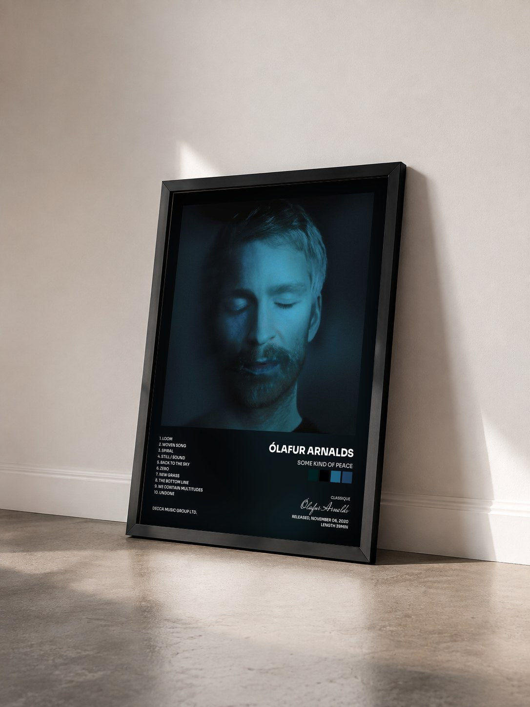 #noir Tableau de l'album some kind of peace de Ólafur Arnalds vu de trois quarts, cadre noir