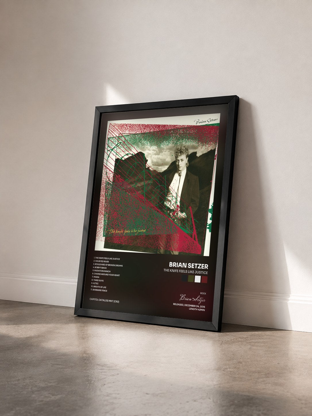 #noir Tableau de l'album The Knife Feels Like Justice de Brian Setzer vu de trois quarts, cadre noir