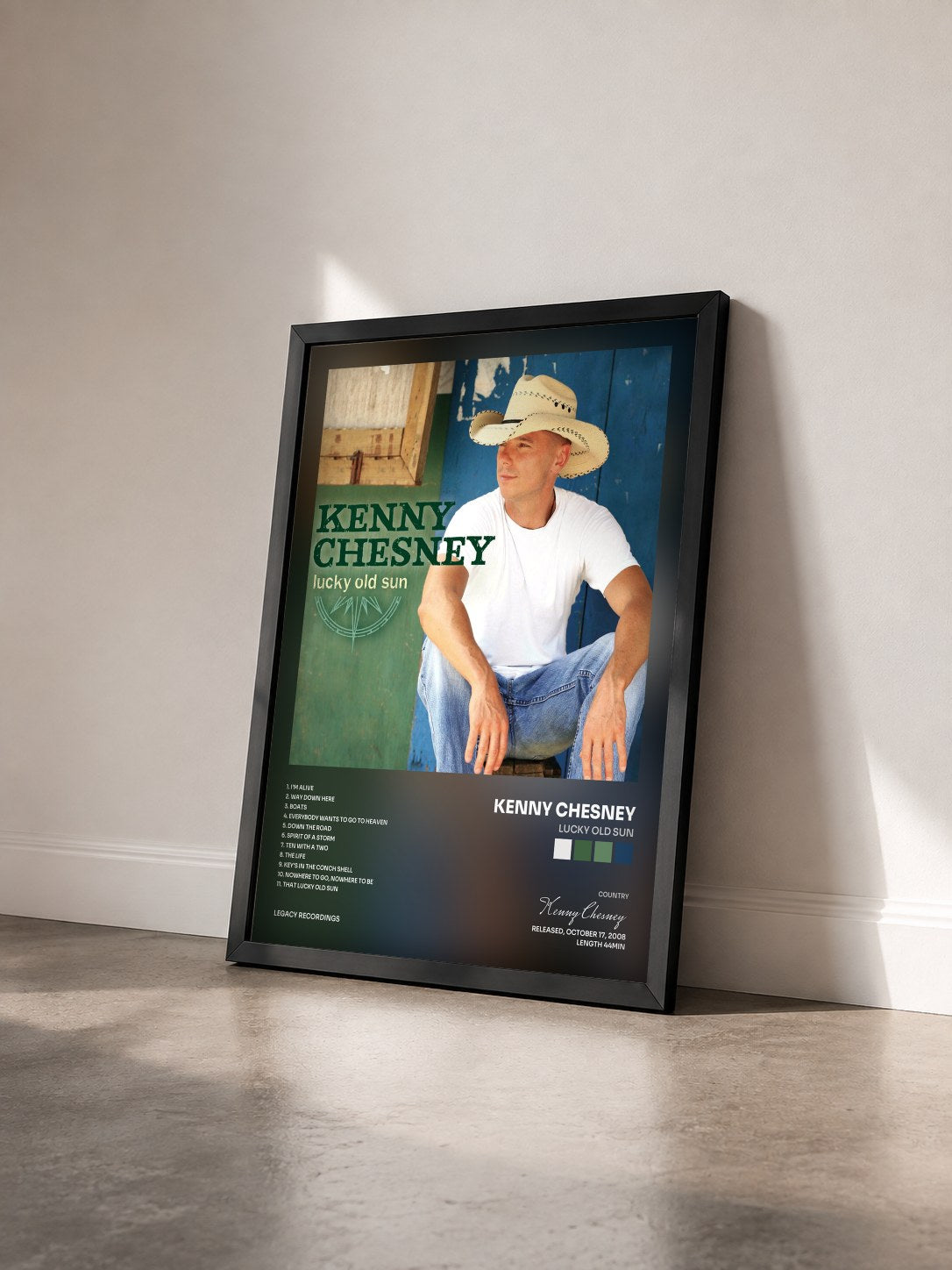 #noir Tableau de l'album Lucky Old Sun de Kenny Chesney vu de trois quarts, cadre noir