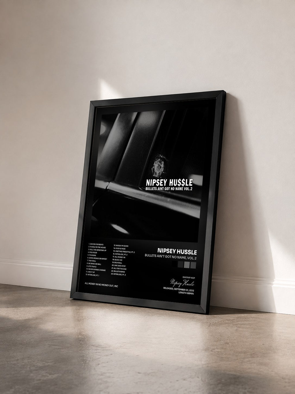 #noir Tableau de l'album Bullets Ain't Got No Name, Vol. 2 de Nipsey Hussle vu de trois quarts, cadre noir