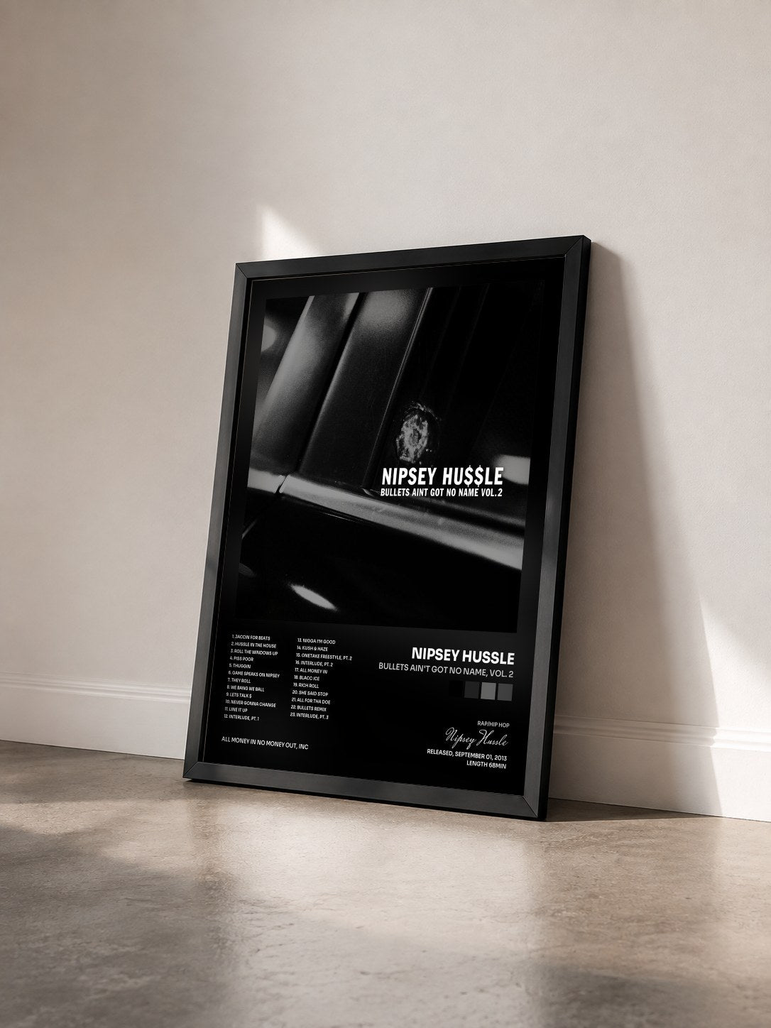 #noir Tableau de l'album Bullets Ain't Got No Name, Vol. 2 de Nipsey Hussle vu de trois quarts, cadre noir