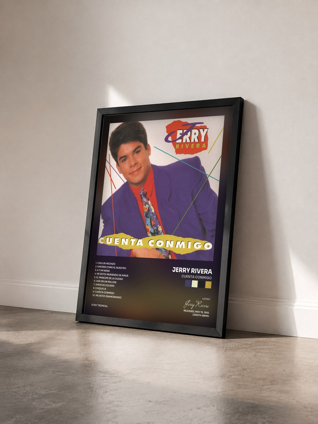 #noir Tableau de l'album Cuenta Conmigo de Jerry Rivera vu de trois quarts, cadre noir