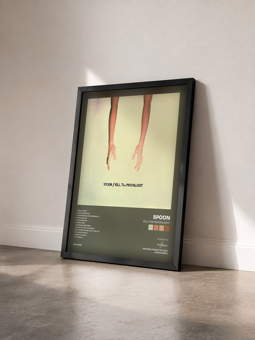 #noir Tableau de l'album Kill the Moonlight de Spoon vu de trois quarts, cadre noir