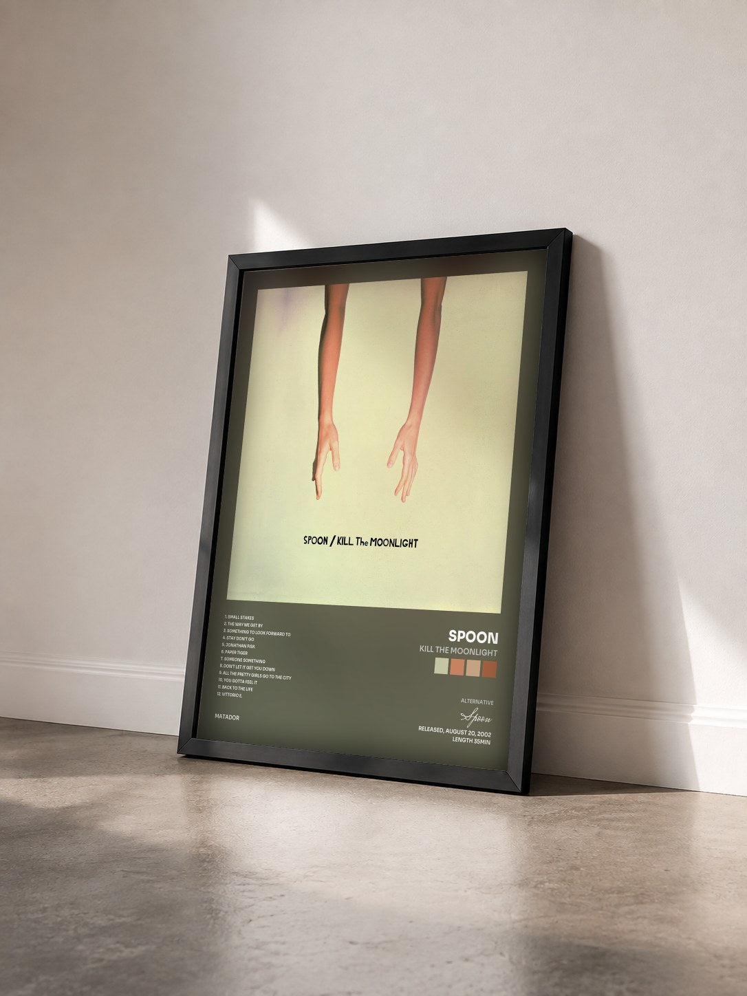 #noir Tableau de l'album Kill the Moonlight de Spoon vu de trois quarts, cadre noir