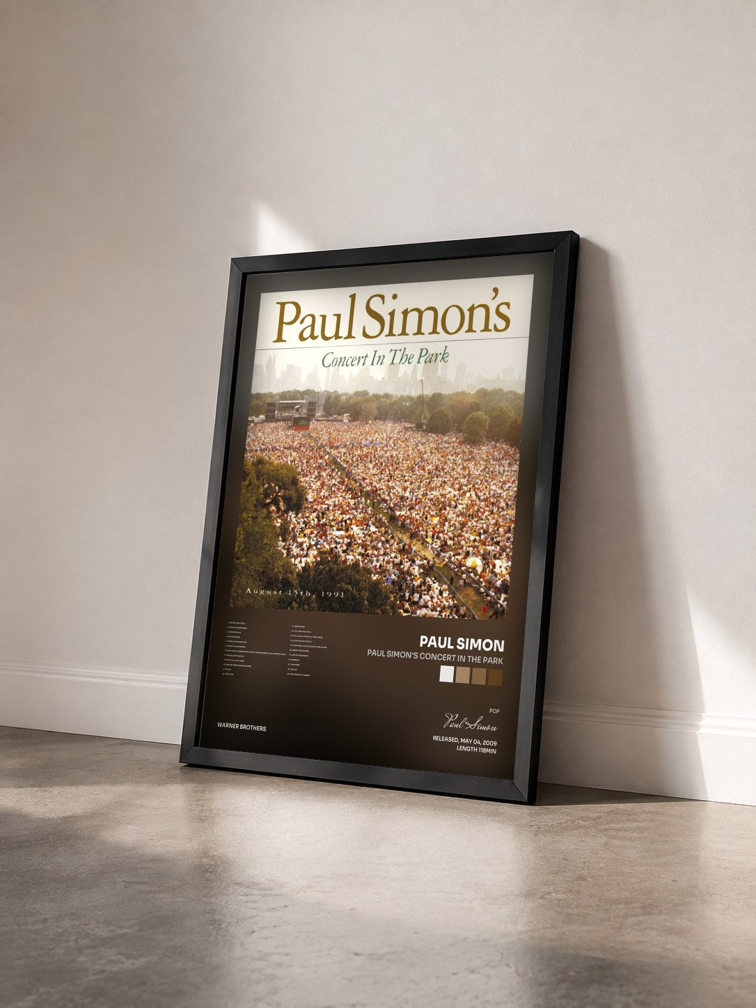 #noir Tableau de l'album Paul Simon's Concert In The Park de Paul Simon vu de trois quarts, cadre noir