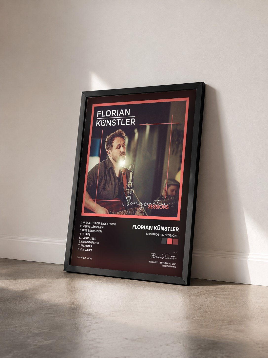 #noir Tableau de l'album Songpoeten Sessions de Florian Künstler vu de trois quarts, cadre noir