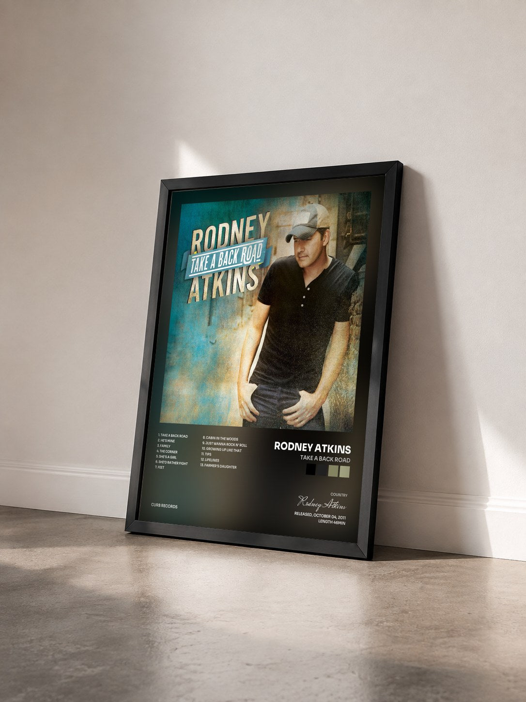 #noir Tableau de l'album Take A Back Road de Rodney Atkins vu de trois quarts, cadre noir