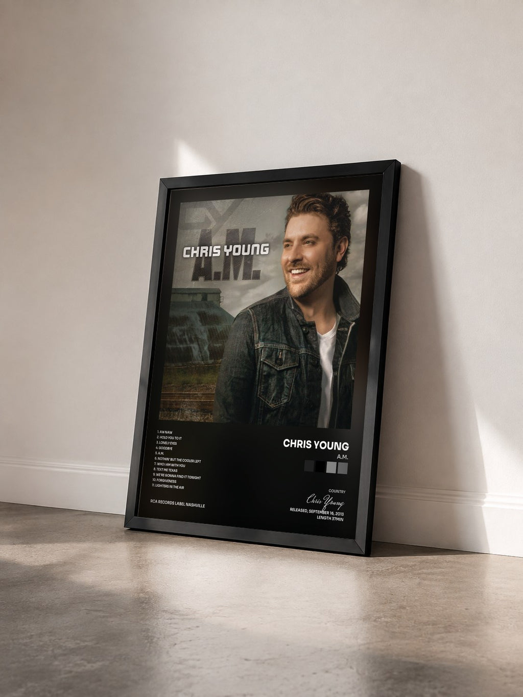 #noir Tableau de l'album A.M. de Chris Young vu de trois quarts, cadre noir