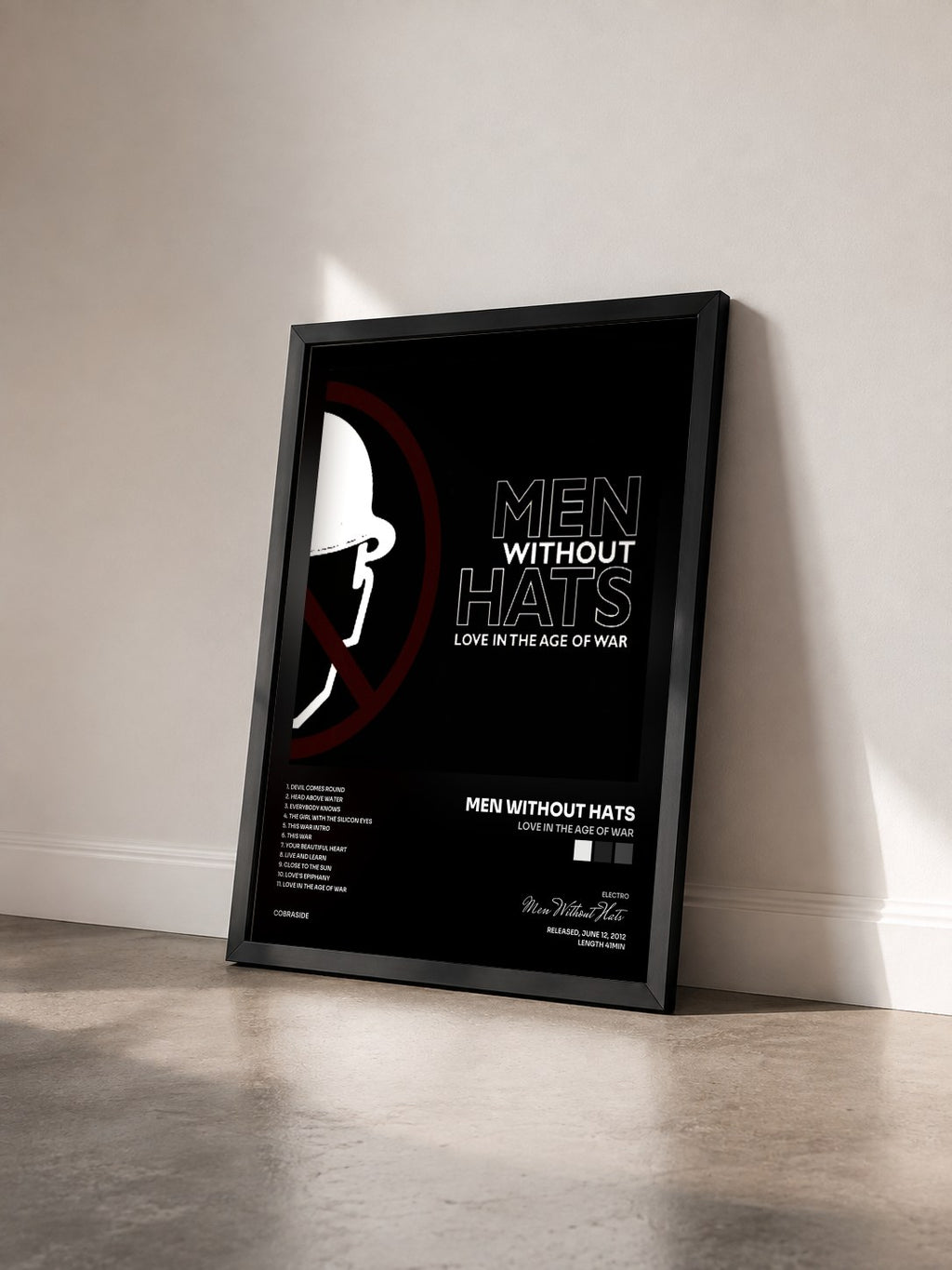 #noir Tableau de l'album Love In The Age Of War de Men Without Hats vu de trois quarts, cadre noir