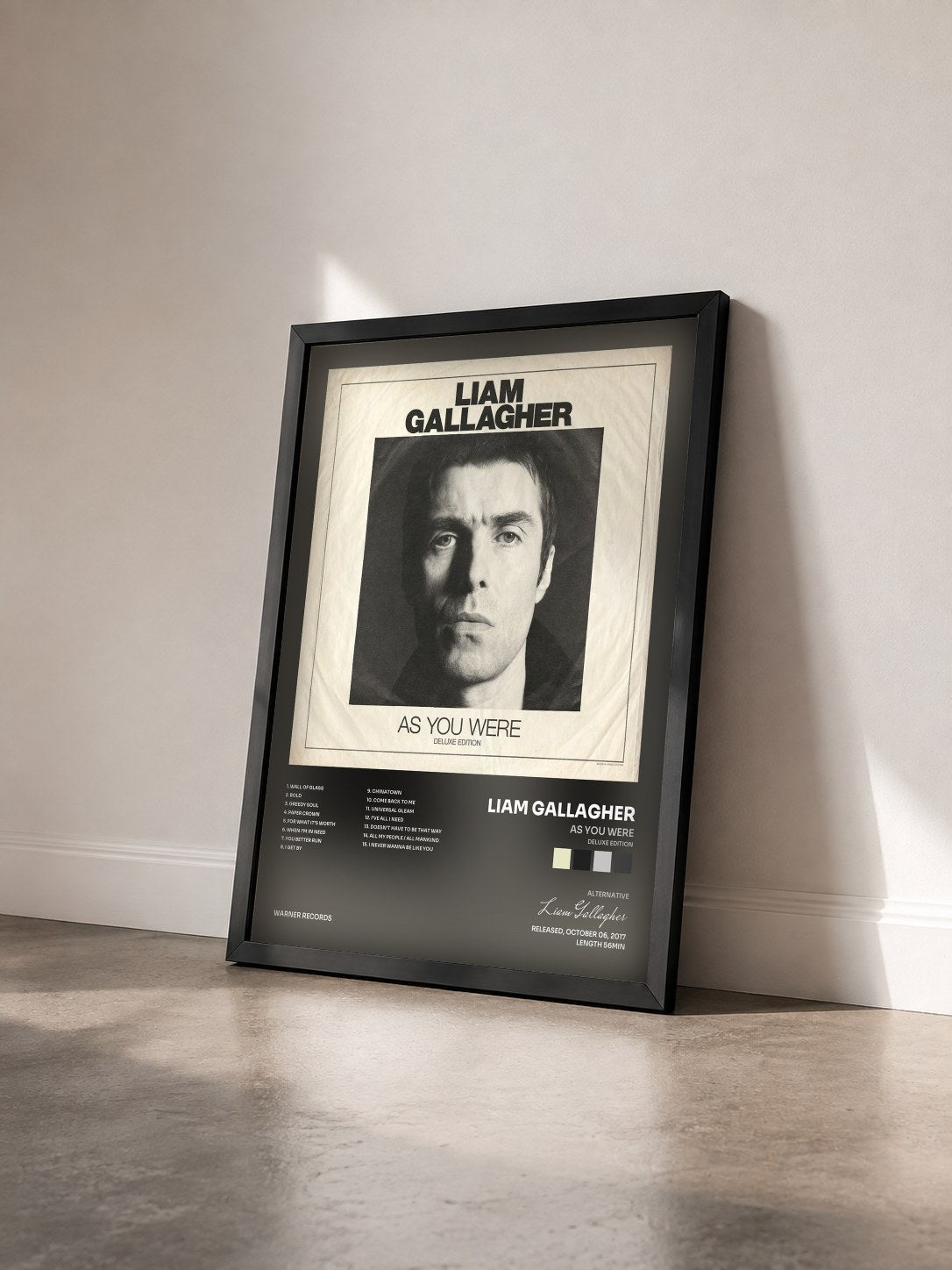 #noir Tableau de l'album As You Were (Deluxe Edition) de Liam Gallagher vu de trois quarts, cadre noir