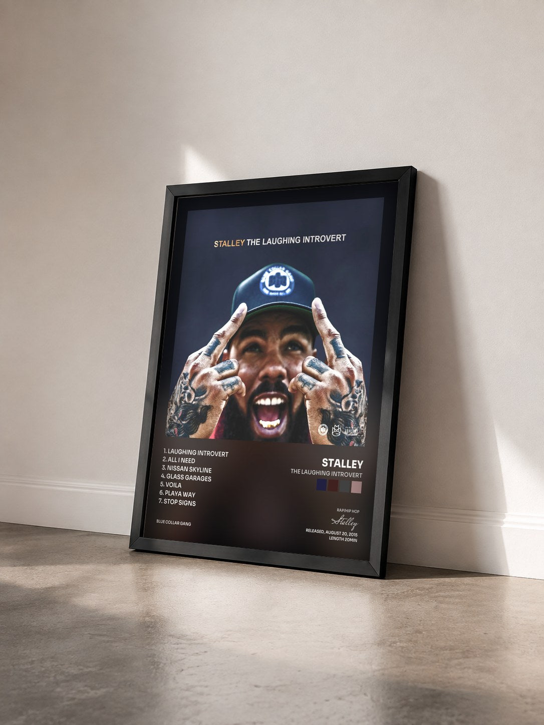 #noir Tableau de l'album The Laughing Introvert de Stalley vu de trois quarts, cadre noir