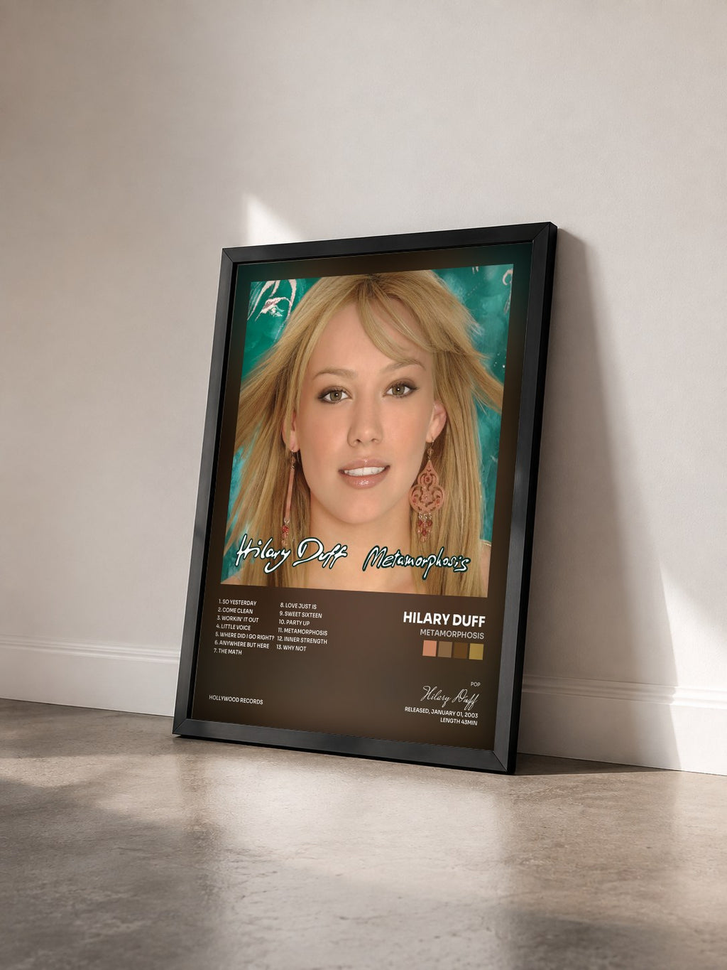 #noir Tableau de l'album Metamorphosis de Hilary Duff vu de trois quarts, cadre noir