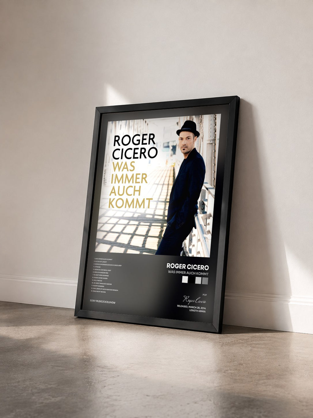 #noir Tableau de l'album Was immer auch kommt de Roger Cicero vu de trois quarts, cadre noir