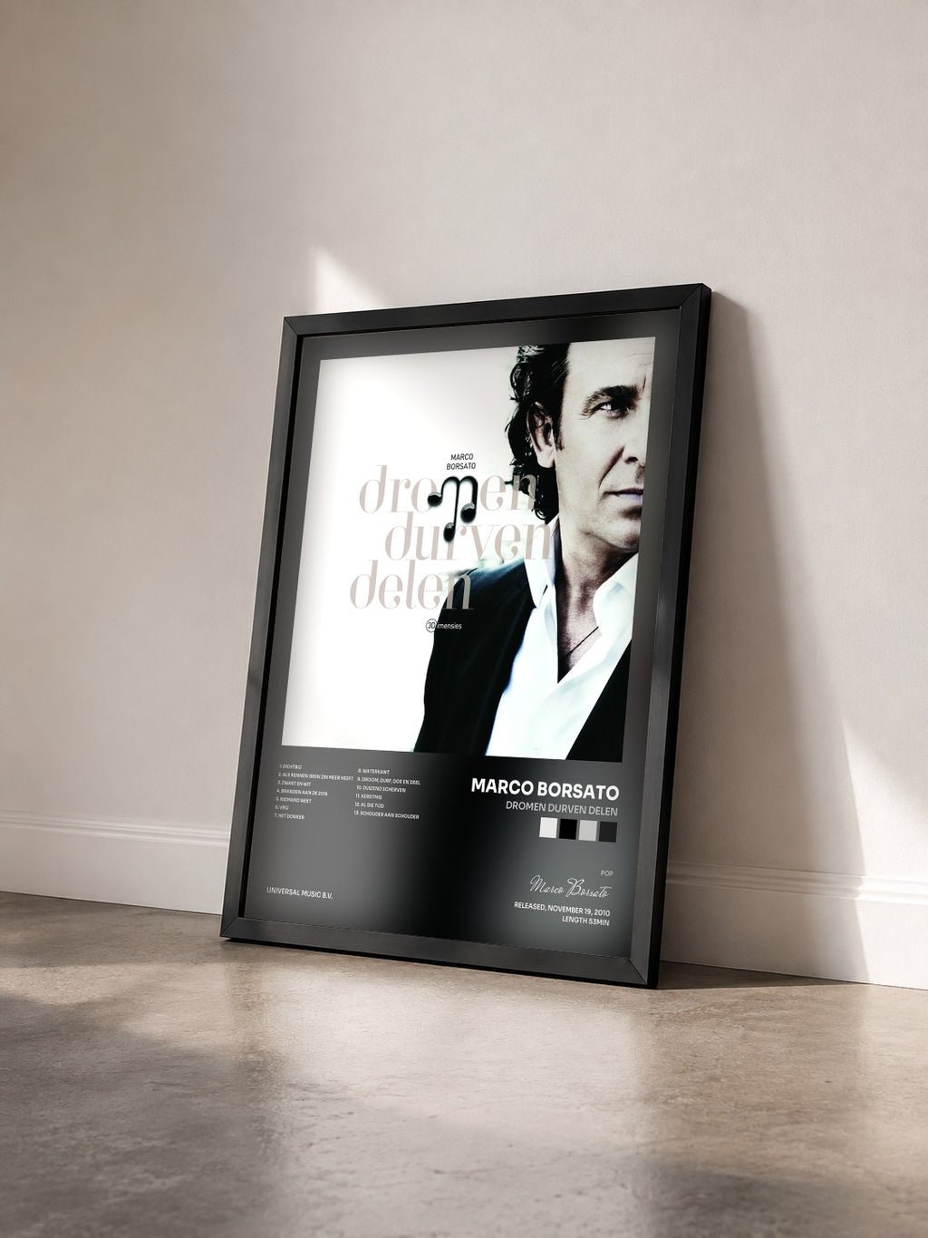 #noir Tableau de l'album Dromen Durven Delen de Marco Borsato vu de trois quarts, cadre noir